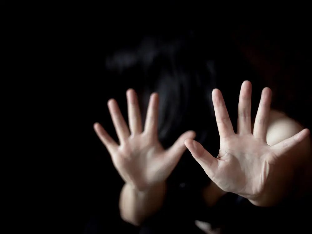 Hands Pressed Against the frame frantically