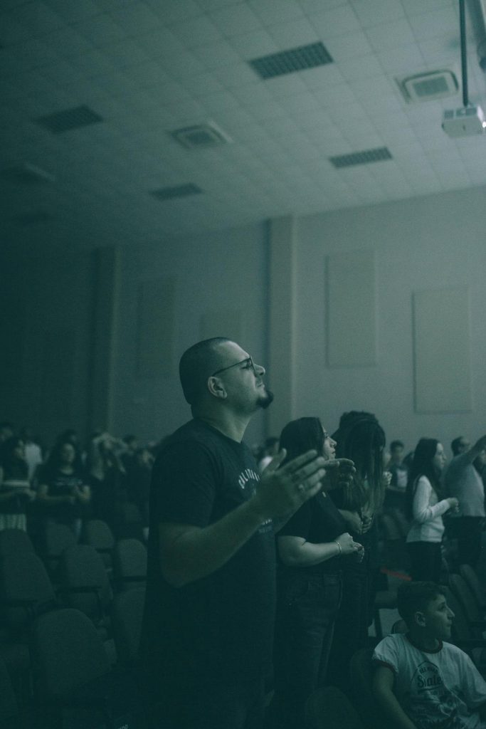Congregation standing in church